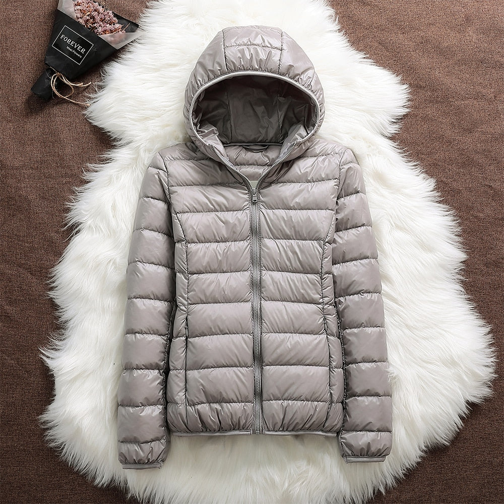 Nord – Manteau imperméable avec garnissage en duvet de canard blanc