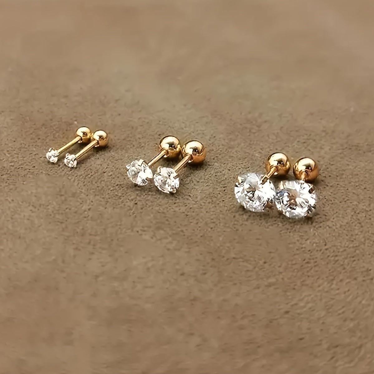Boucles d’oreilles torsadées zircon