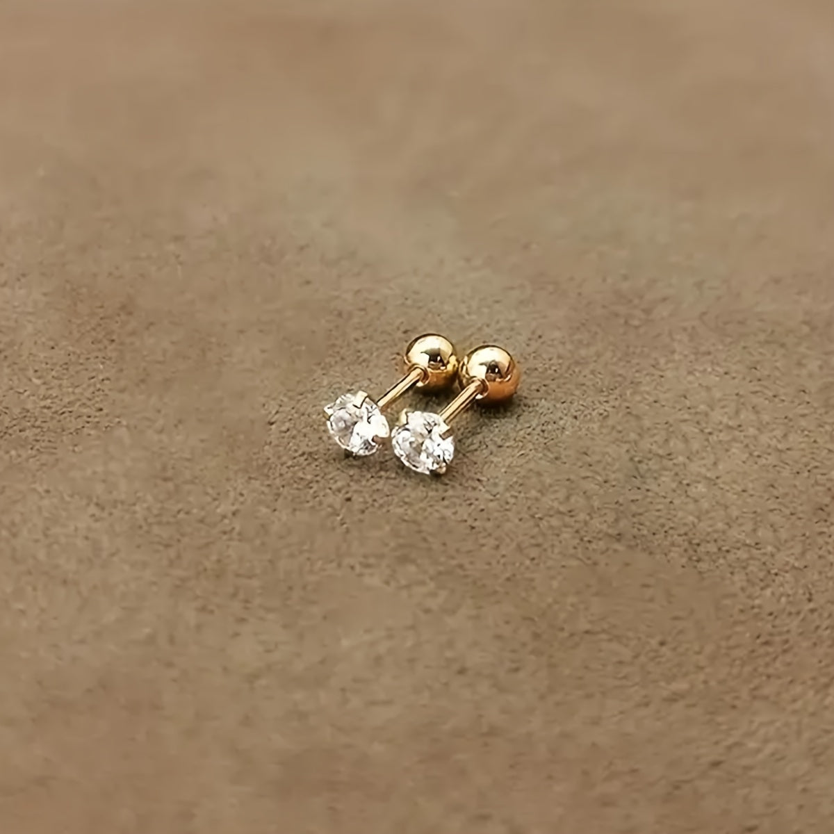 Boucles d’oreilles torsadées zircon