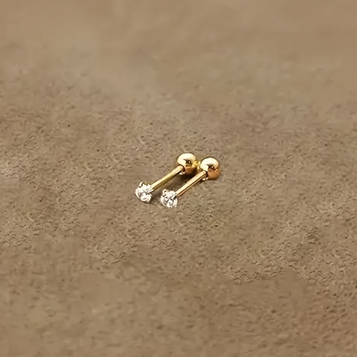Boucles d’oreilles torsadées zircon