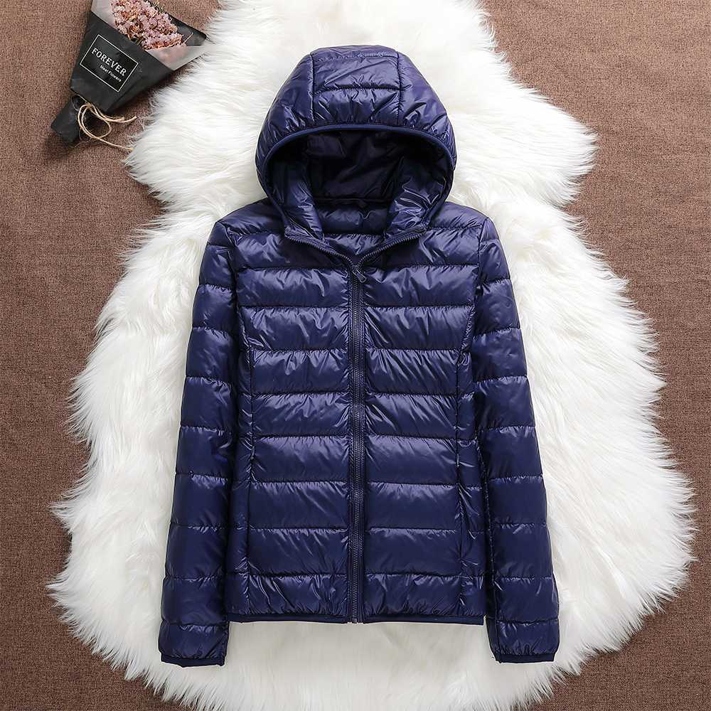 Nord – Manteau imperméable avec garnissage en duvet de canard blanc